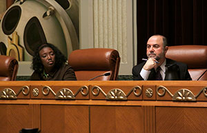 Image of members of the Board of Commissioners on Grievances & Discipline conducting a disciplinary hearing.
