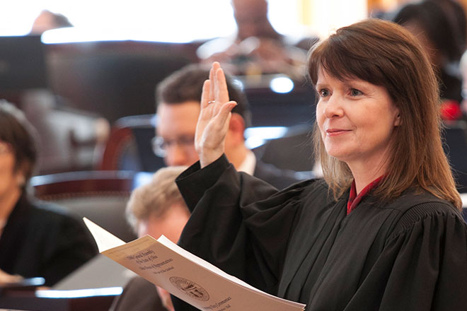 Justice Judith L. French (pictured administering the oath of office to the Ohio House) will be sworn in Wednesday, January 23, during a ceremony in the Statehouse atrium.