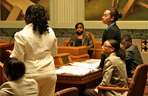 Image of students participating in a Law and Leadership Institute mock trial.