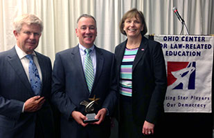 Image of OCLRE Board of Trustees President Marion Smithberger, Rick Dove, secretary to the Board of Commissioners on Grievances & Discipline, and OCLRE Executive Director Lisa Eschleman