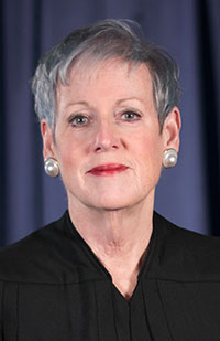 Image is a headshot photo of Chief Justice Maureen O'Connor in her black judicial robe