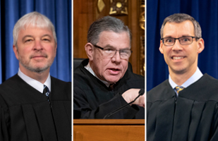 Image of three male judges wearing black judicial robes