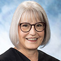 Image of a smiling female judge