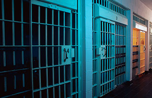 Image of a row of prison cells