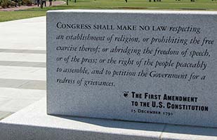 Image of a marble monument with the First Amendment to the U.S. Constitution engraved in it