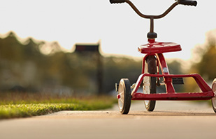 Image of a red tricycle