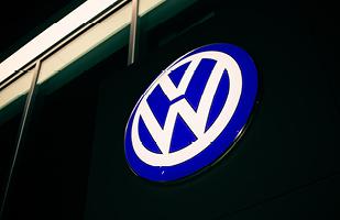 Image of the blue and white V W logo of Volkswagen
