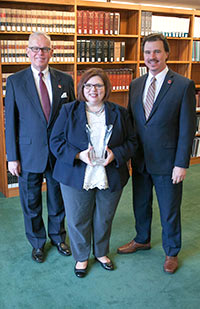 Image of W. Milt Nuzum III, Dot Keil, and Brian Farrington with their OJMA Award of Excellence