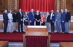 Image of Ohio Supreme Court Chief Justice Maureen O'Connor with a group of University of Dayton Statehouse Civic Scholars.