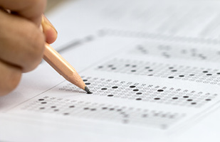 Image of a multiple choice fill-in test answer sheet (smolaw11/iStock)
