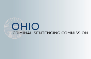 Image of a light blue rectangle with a white round seal and the words Ohio Criminal Sentencing Commission