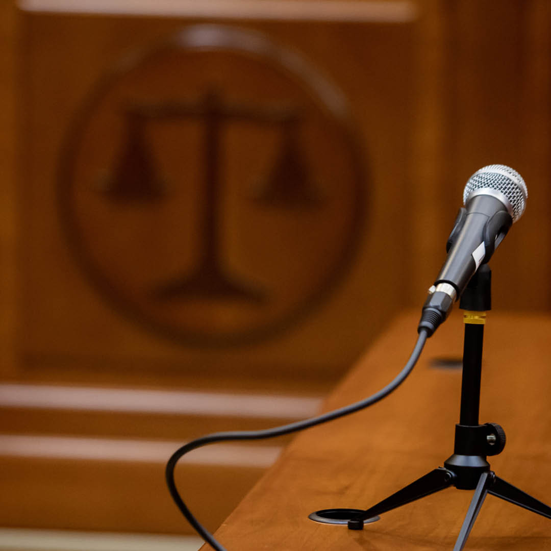 A microphone on a bench in a courtroom