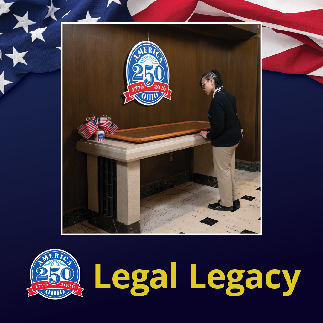 A person looking at a marble display case