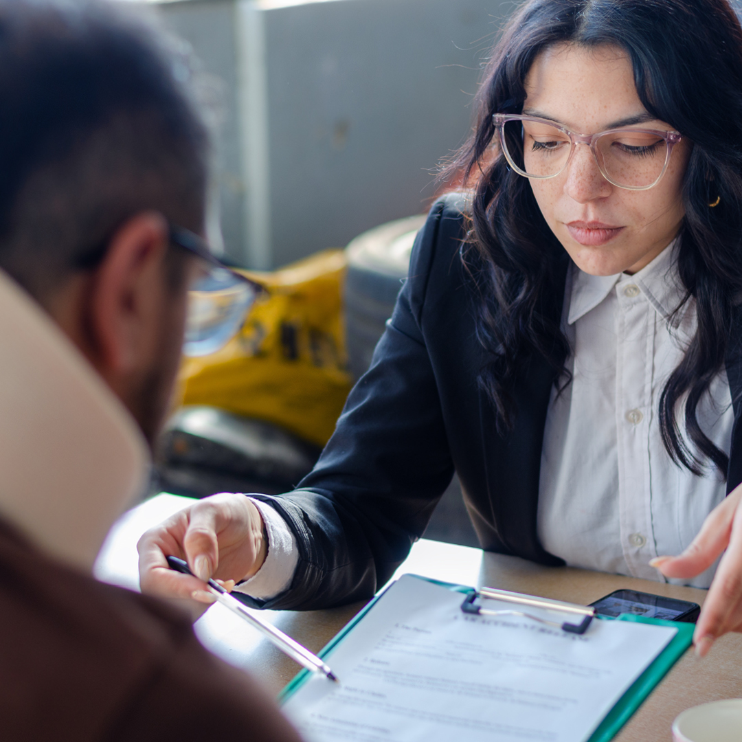 A group of 24 teens and two teachers smiling with a trophy