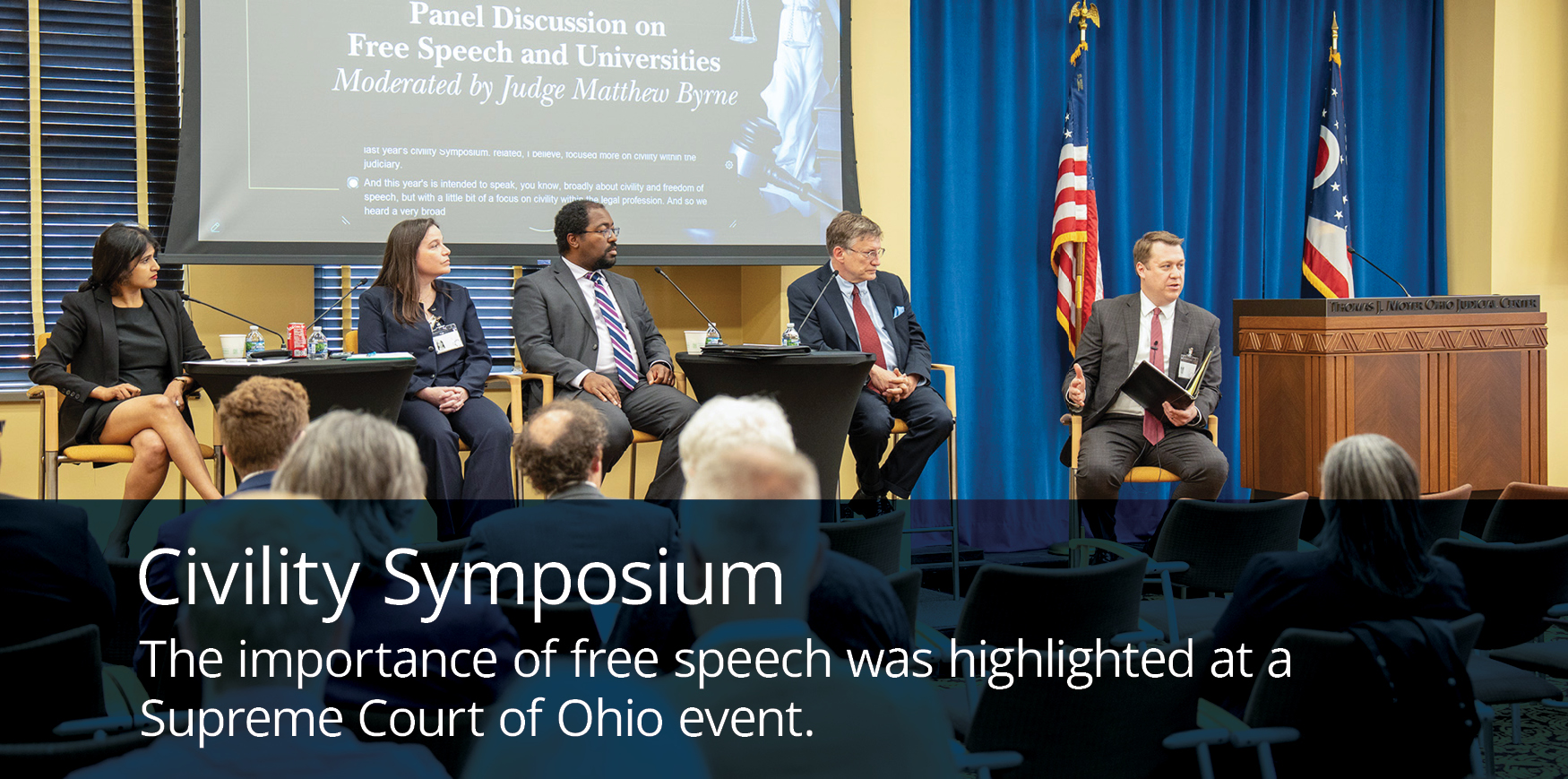 A panel of five speakers is seated on stage at the Supreme Court of Ohio, discussing free speech.