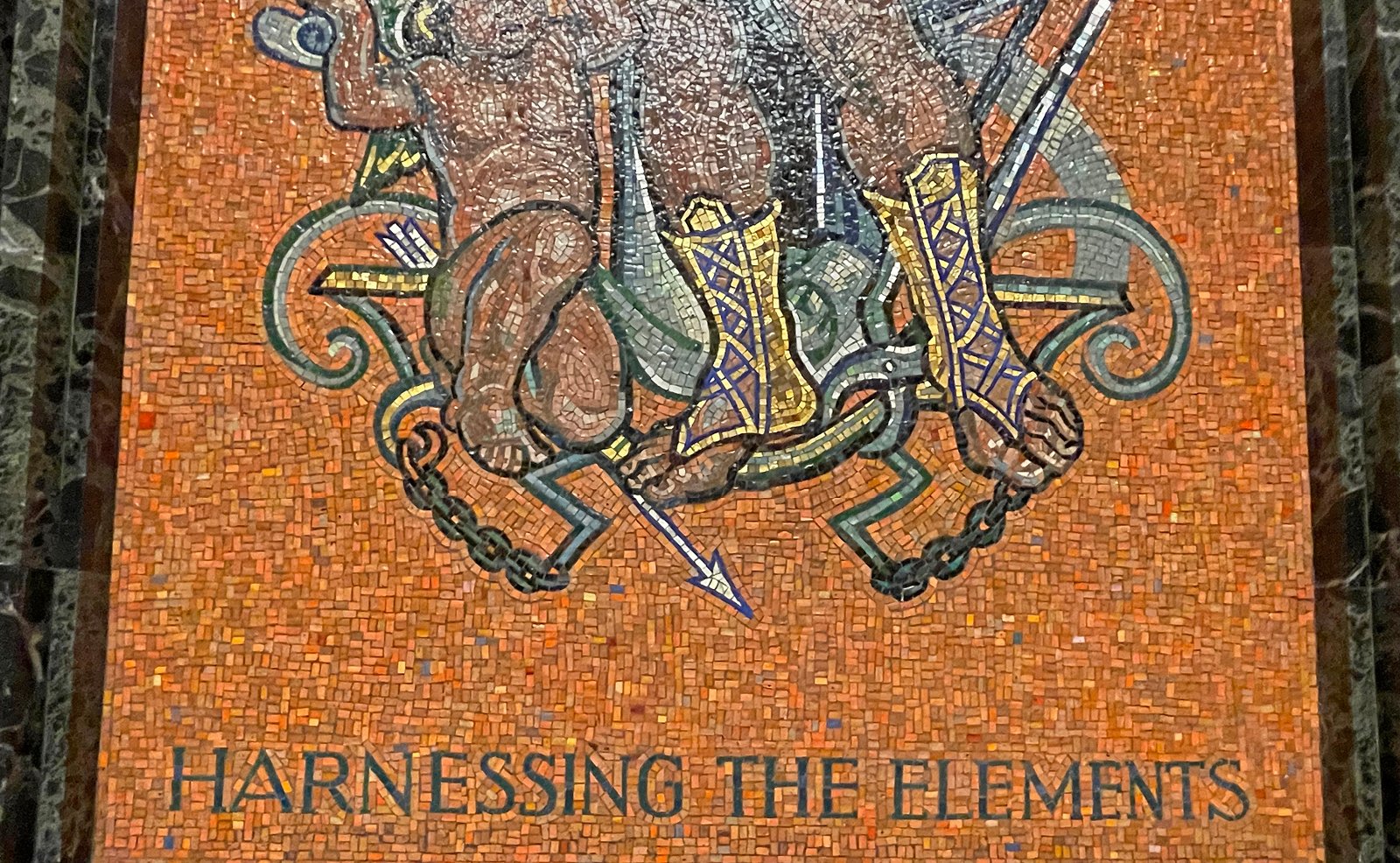 Image of a close-up look at mosaic tile rendering of Roman god Vulcan