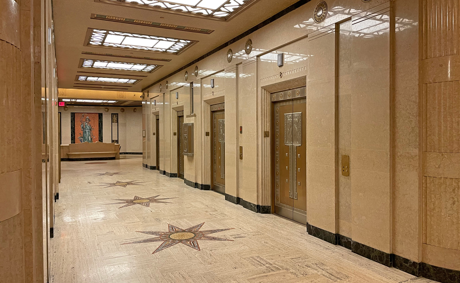 Image of the ornate, bronze elevator doors in the elevator lobby of the Thomas J. Moyer Ohio Judicial Center