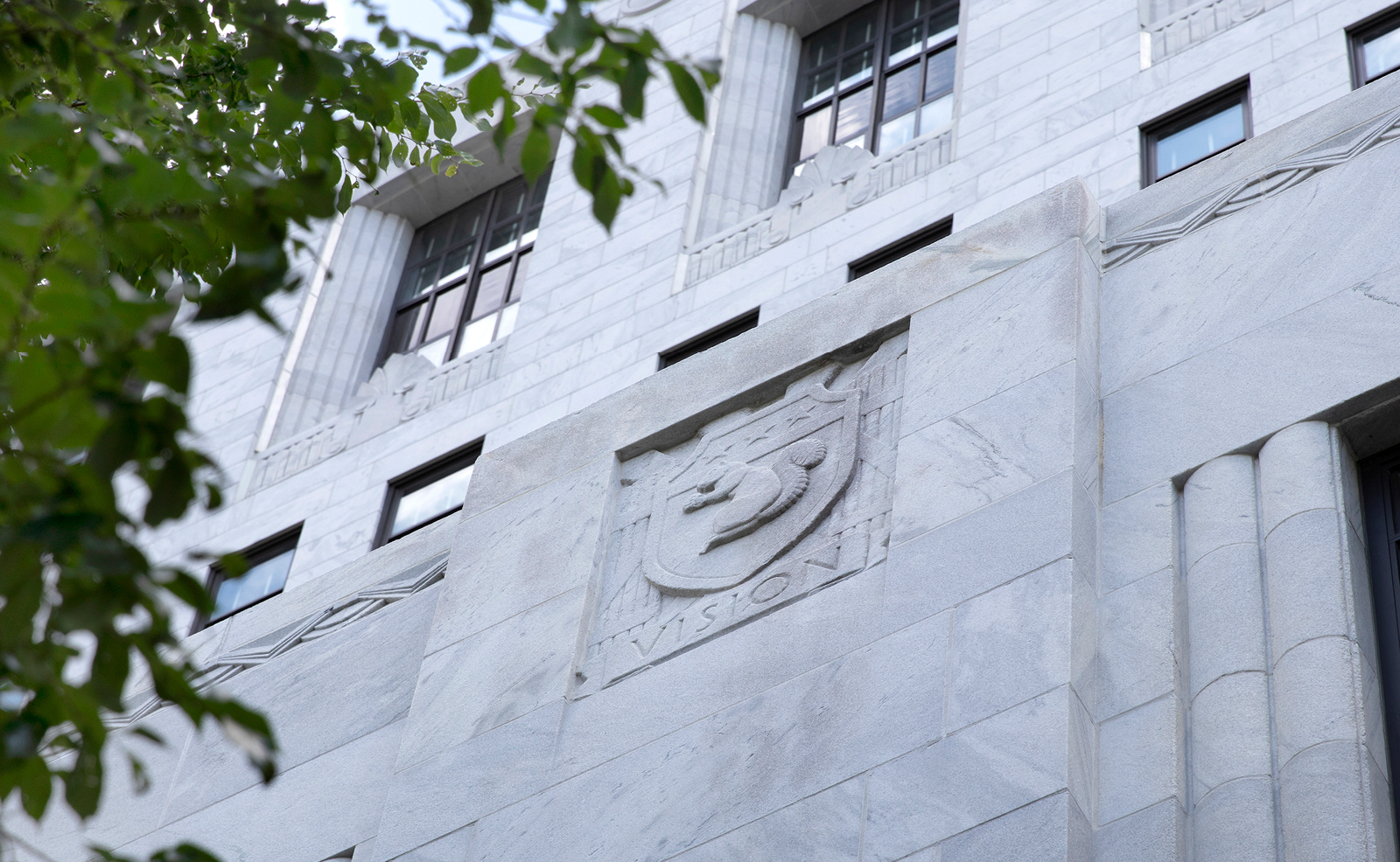 Image of a carving of a squirrel on the west side of the Thomas J. Moyer Ohio Judicial Center. Below the carving is the word 'Vision'
